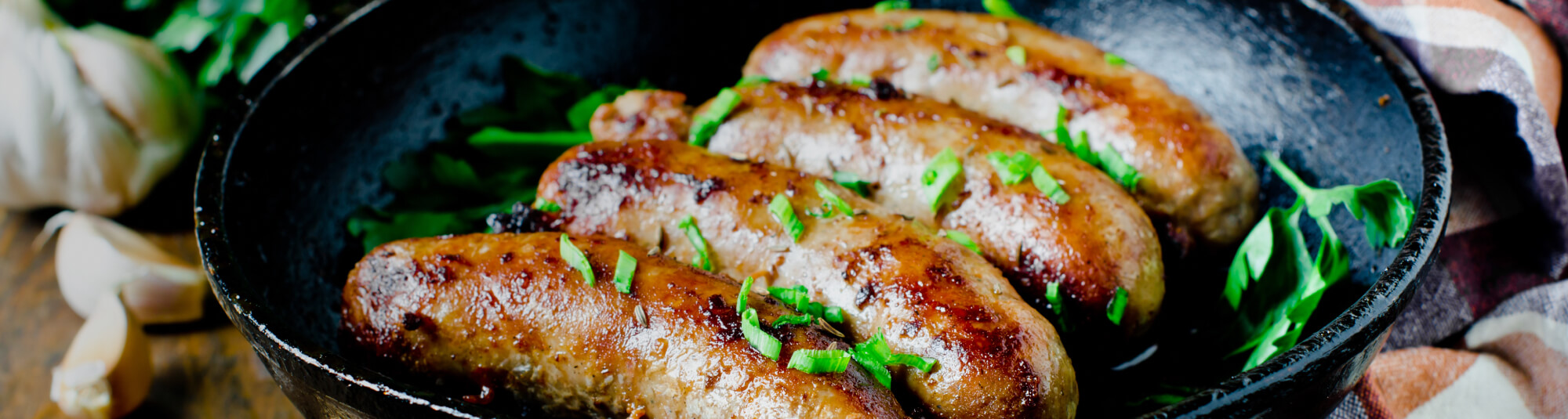 Salchichas al vino blanco