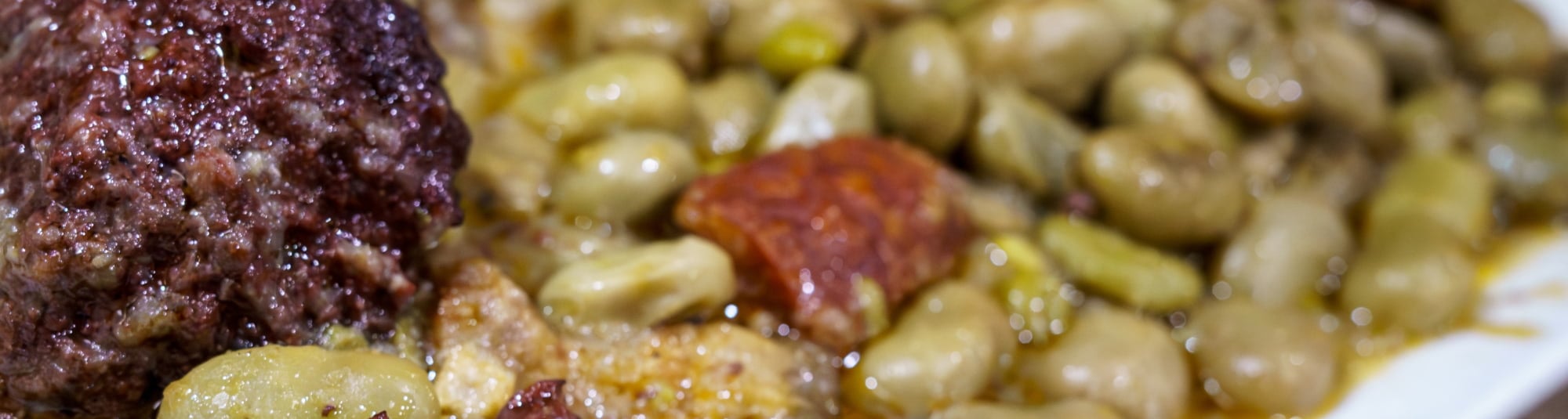 Solomillo cerdo con salsa de habas